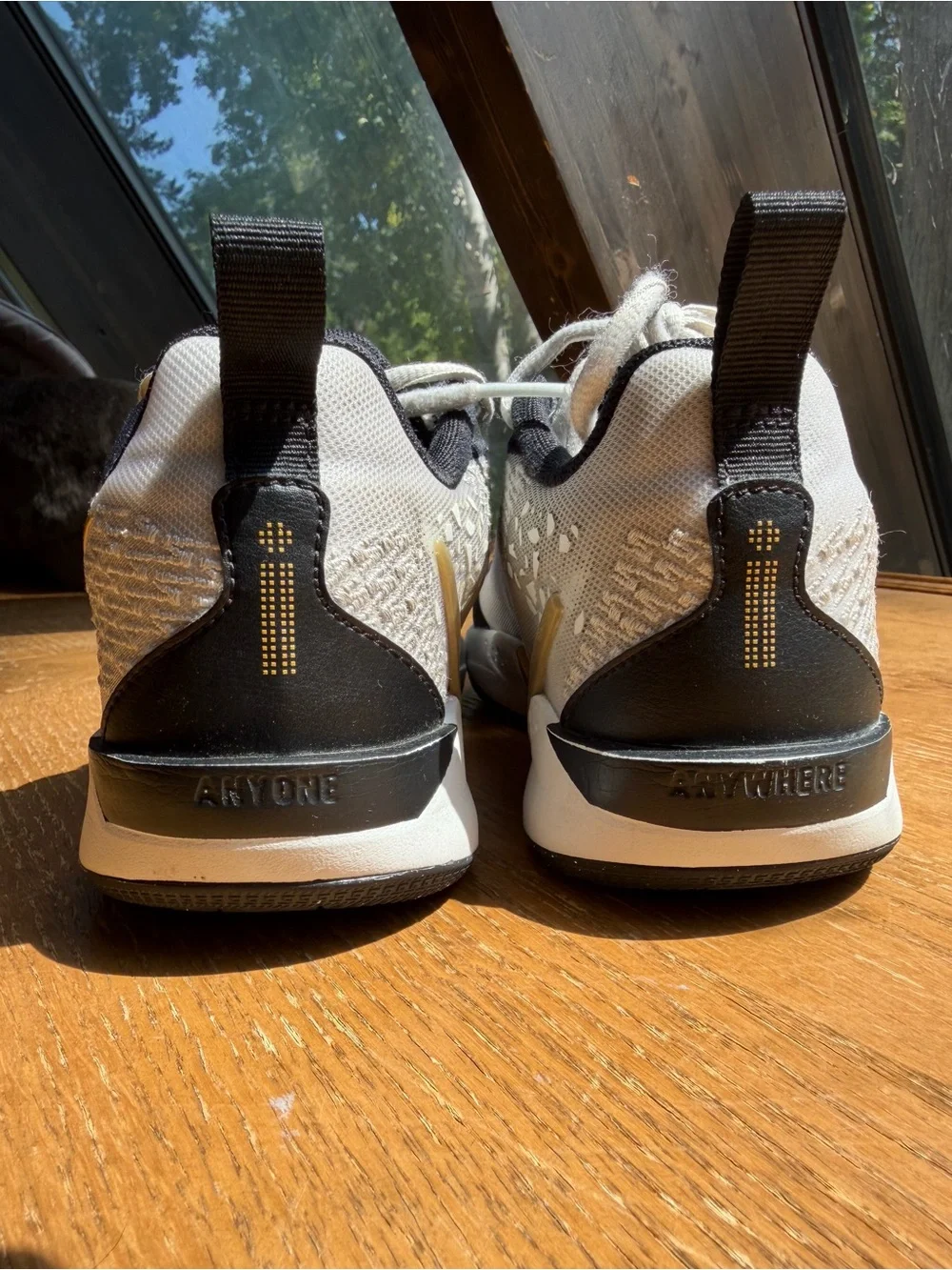 Nike youth White and Black Sneakers with Gold Swoosh Sabrina 2